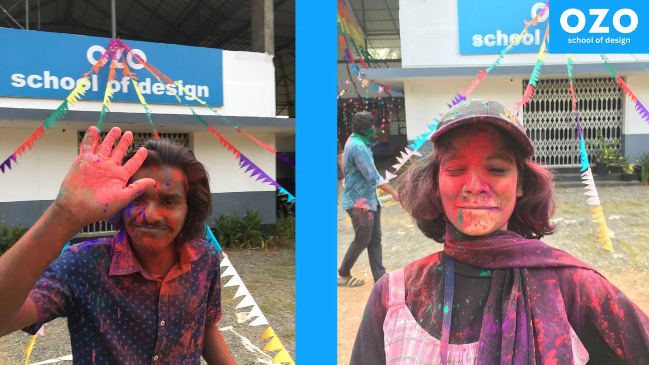 Students with colour powder on their faces at a campus celebration
