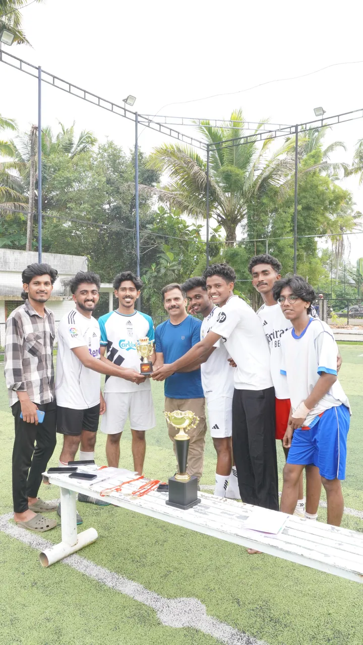 Players receiving the trophy after the final
