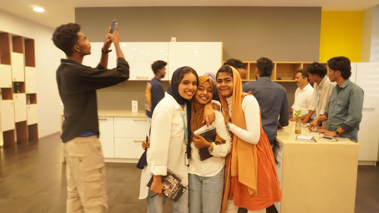 Students exploring a kitchen showroom